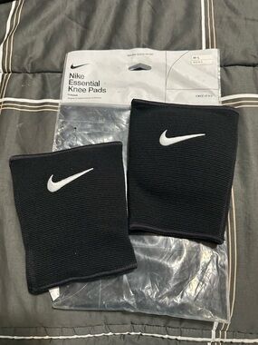 Nike Black Knee Sleeves with White Swoosh